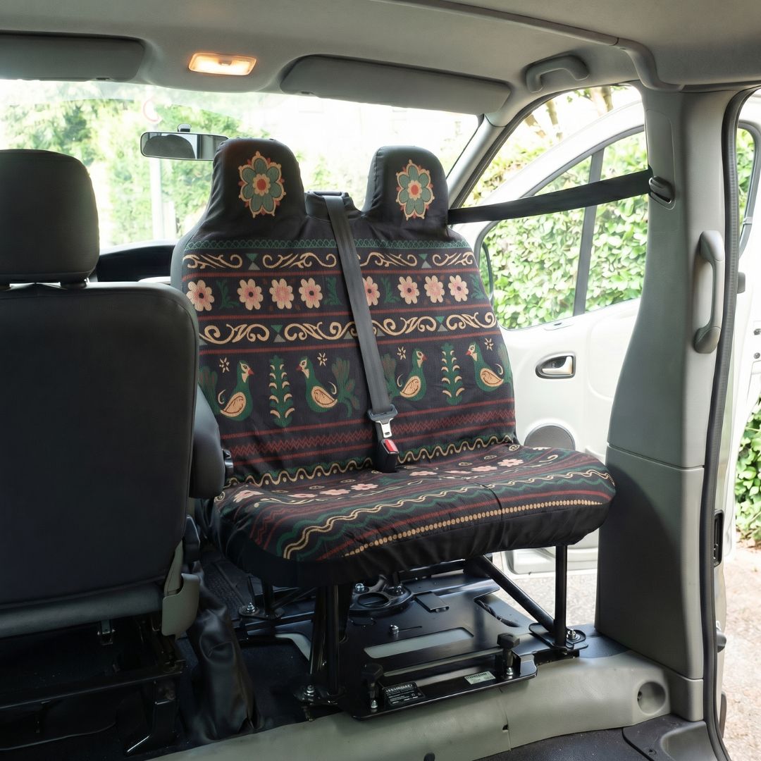 Solara Indira Folk Print double front seat cover - black with floral & deer motifs close-up