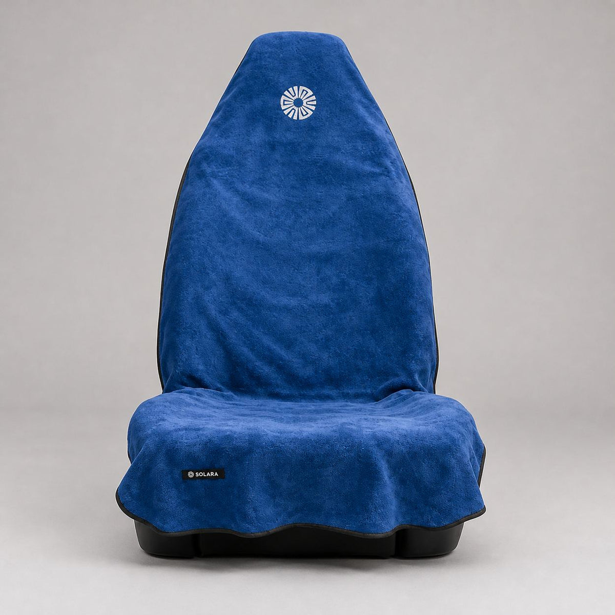 Marina blue car seat towel by Solara covering a front car seat, front view