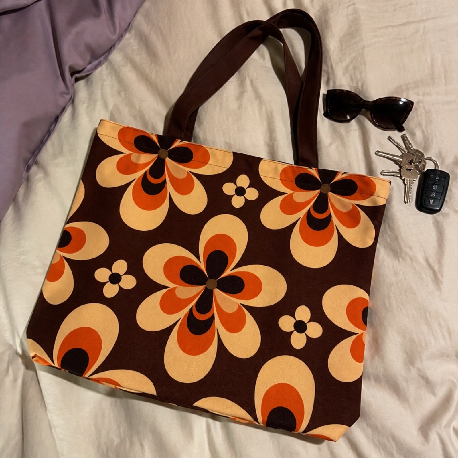 Aesthetic boho tote bag styled on a chair