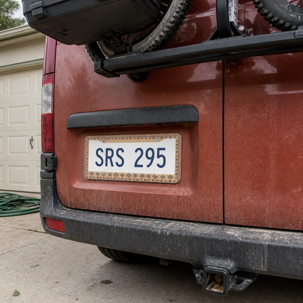 Patterned license plate frame mounted on a car bumper