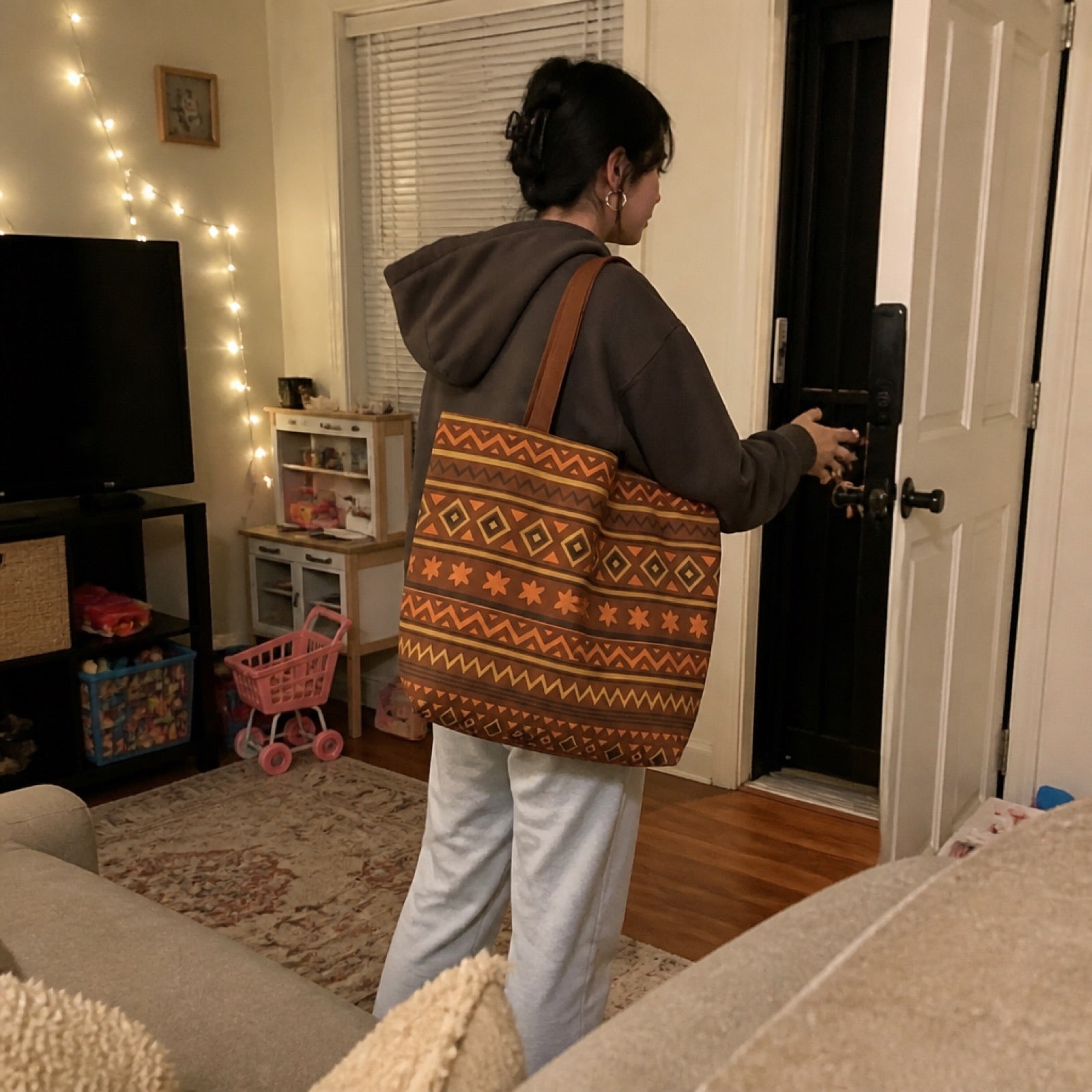 Boho print tote bag styled in a home setting