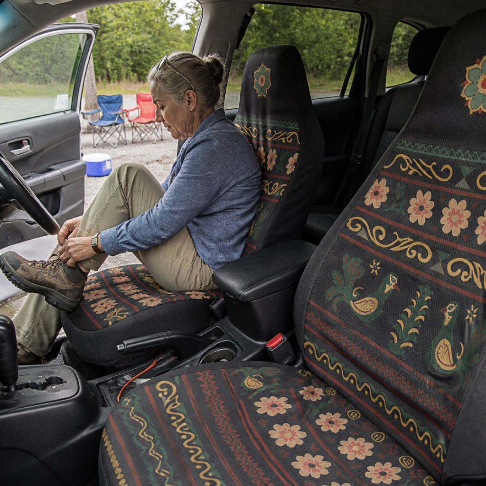 Folk print seat covers in a truck at a night campsite — car camping with Solara Covers