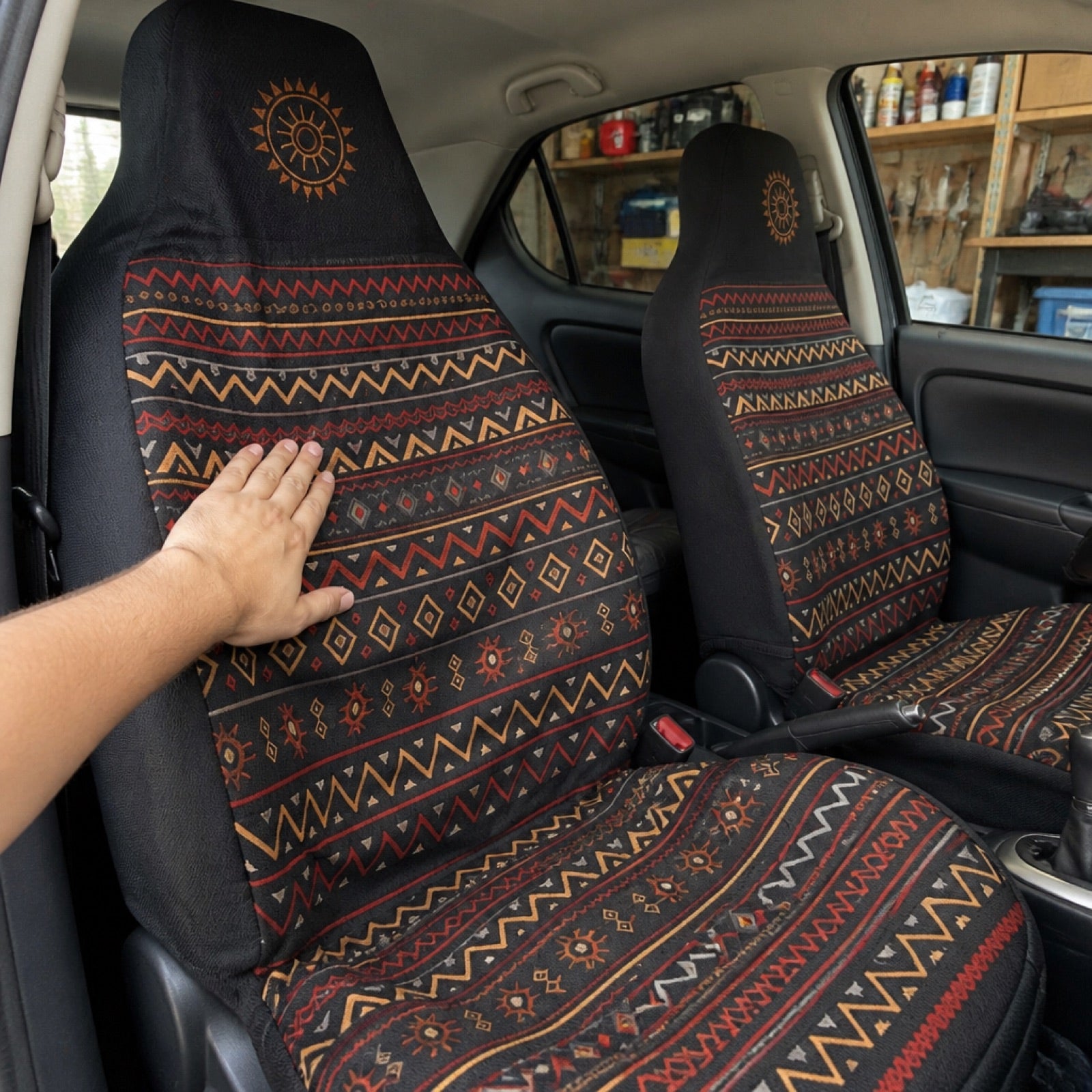 Boho seat covers installed on the front seats of a Chevy Express van