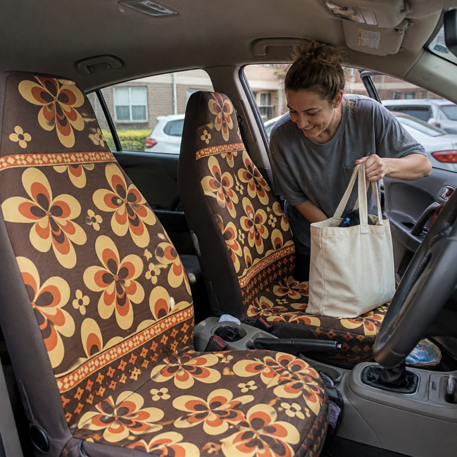Boho seat covers installed on the front seats of a Chrysler Pacifica