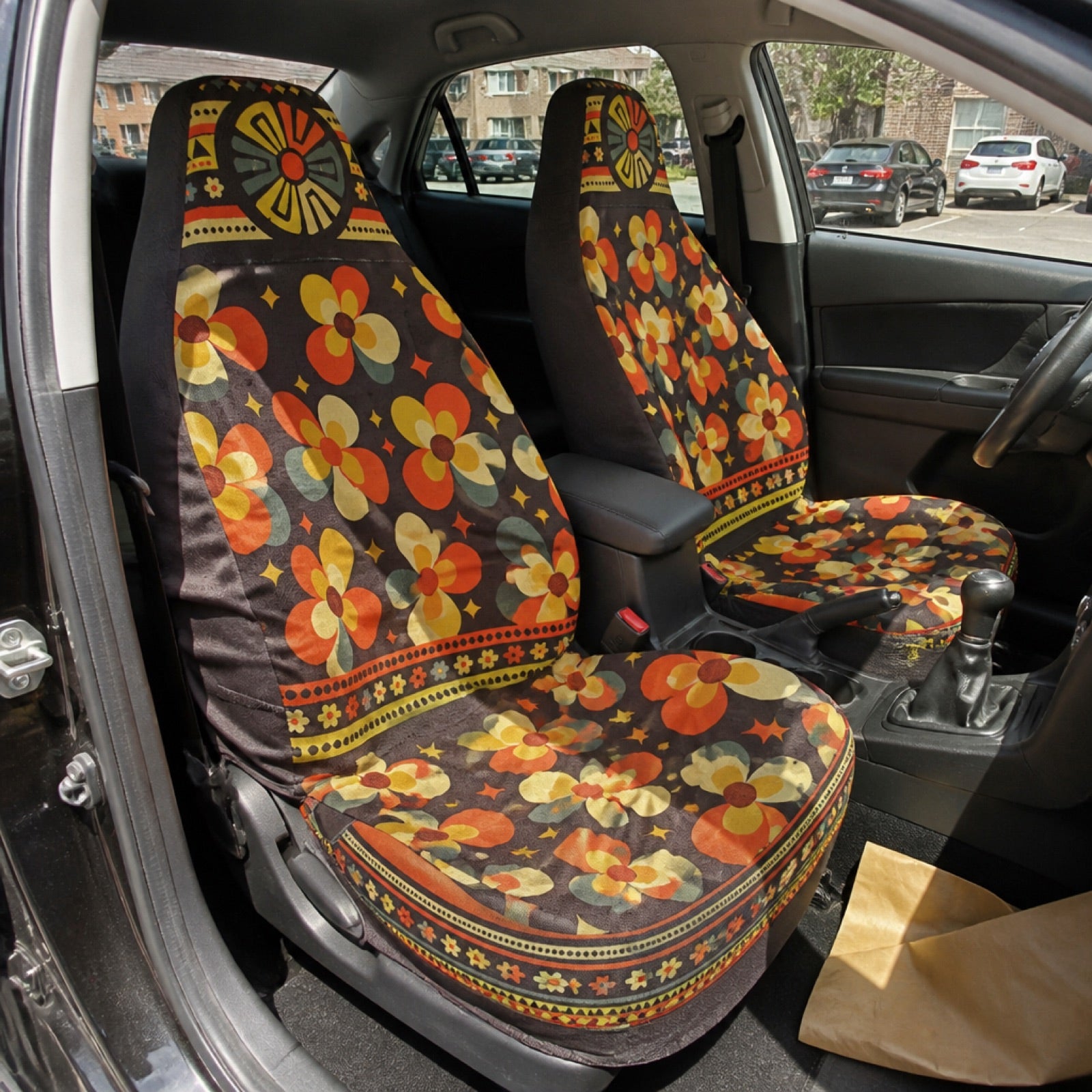 Cute floral-print seat covers installed on a car's front seats
