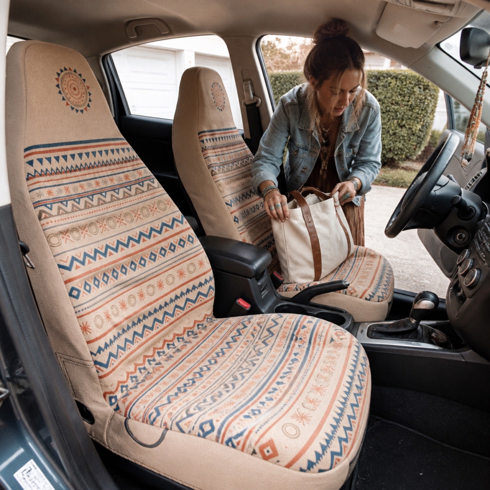 Playful sunburst-print seat covers on a car's front seats