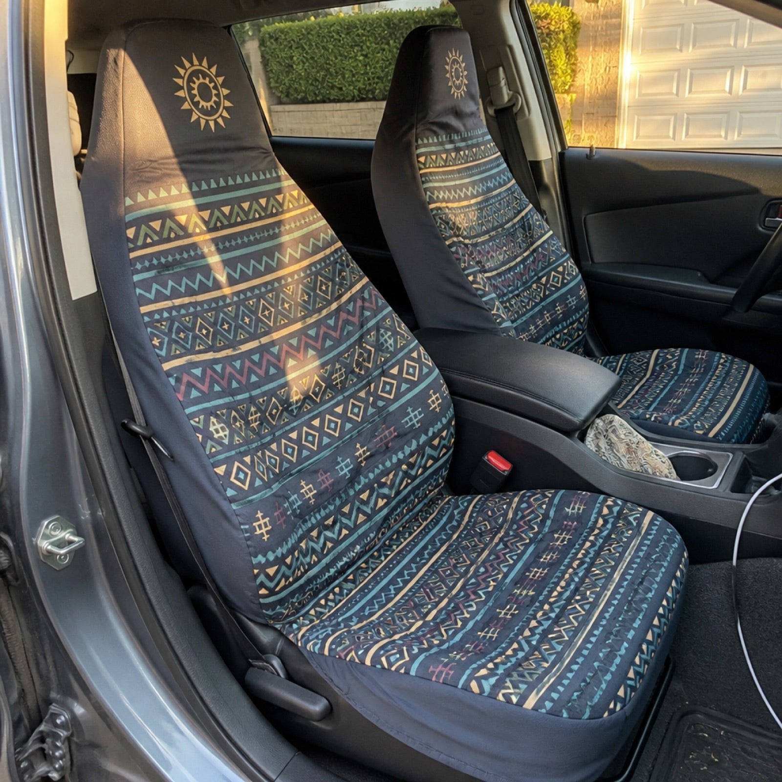 Floral boho seat covers installed on a car's front seats