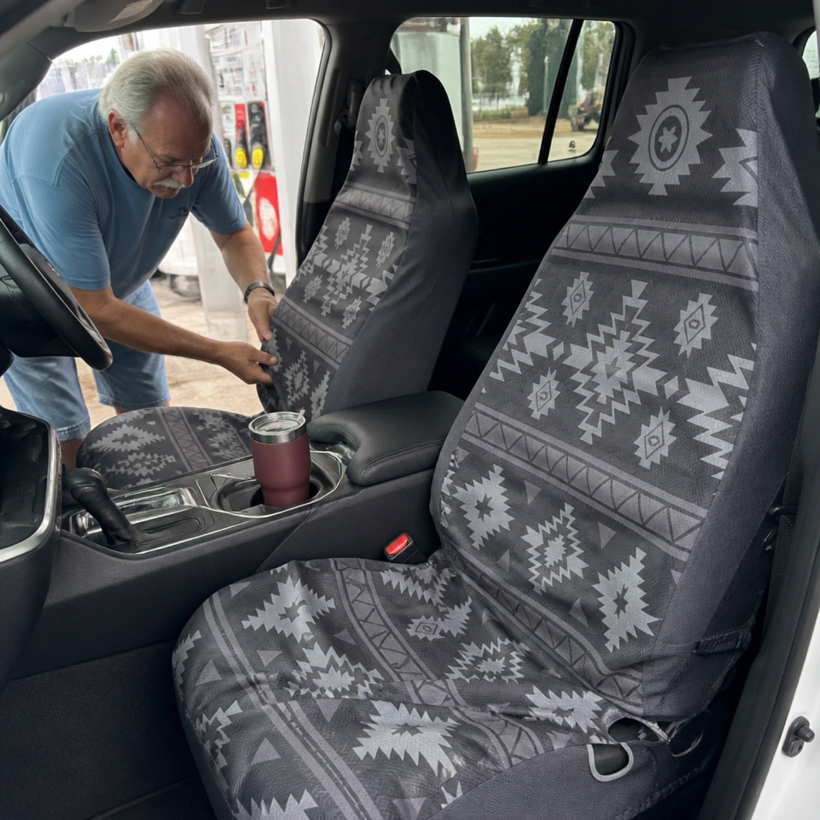 Boho seat covers installed on the front seats of a GMC Yukon