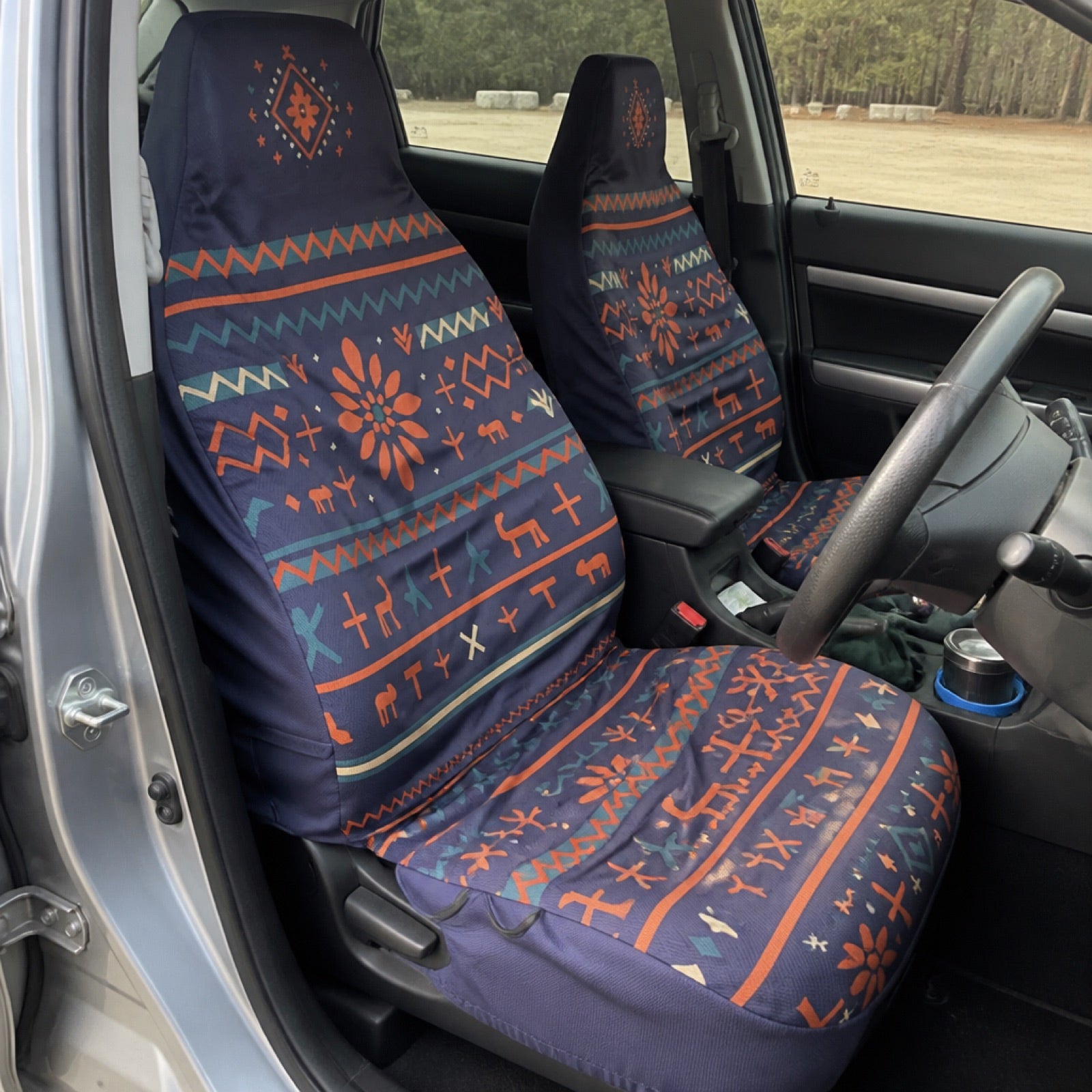 Charcoal grey boho seat covers on a car's front seats