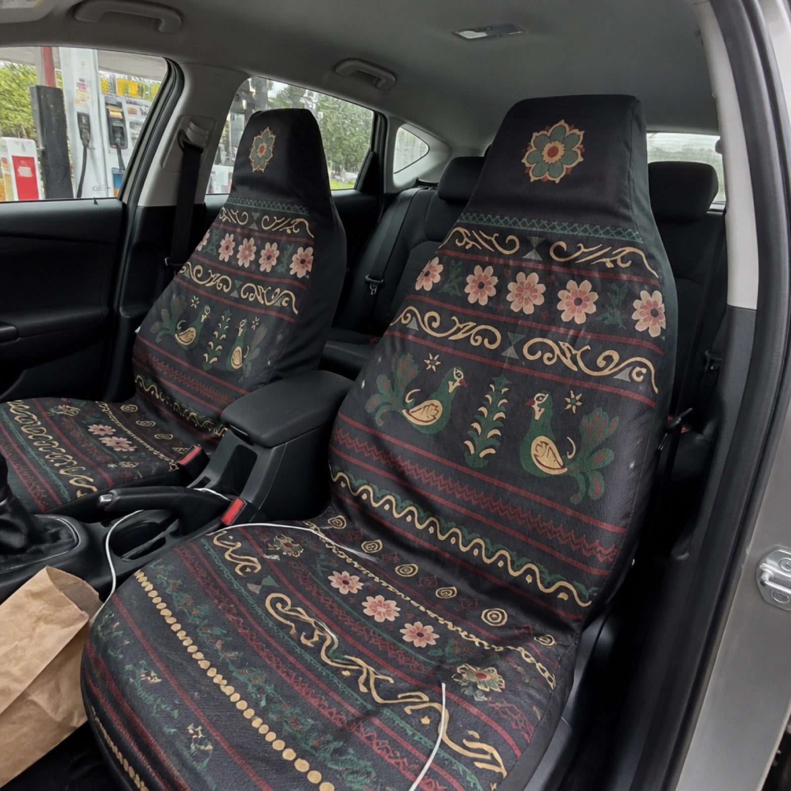 Dark folk print seat covers in an SUV interior | Solara Covers