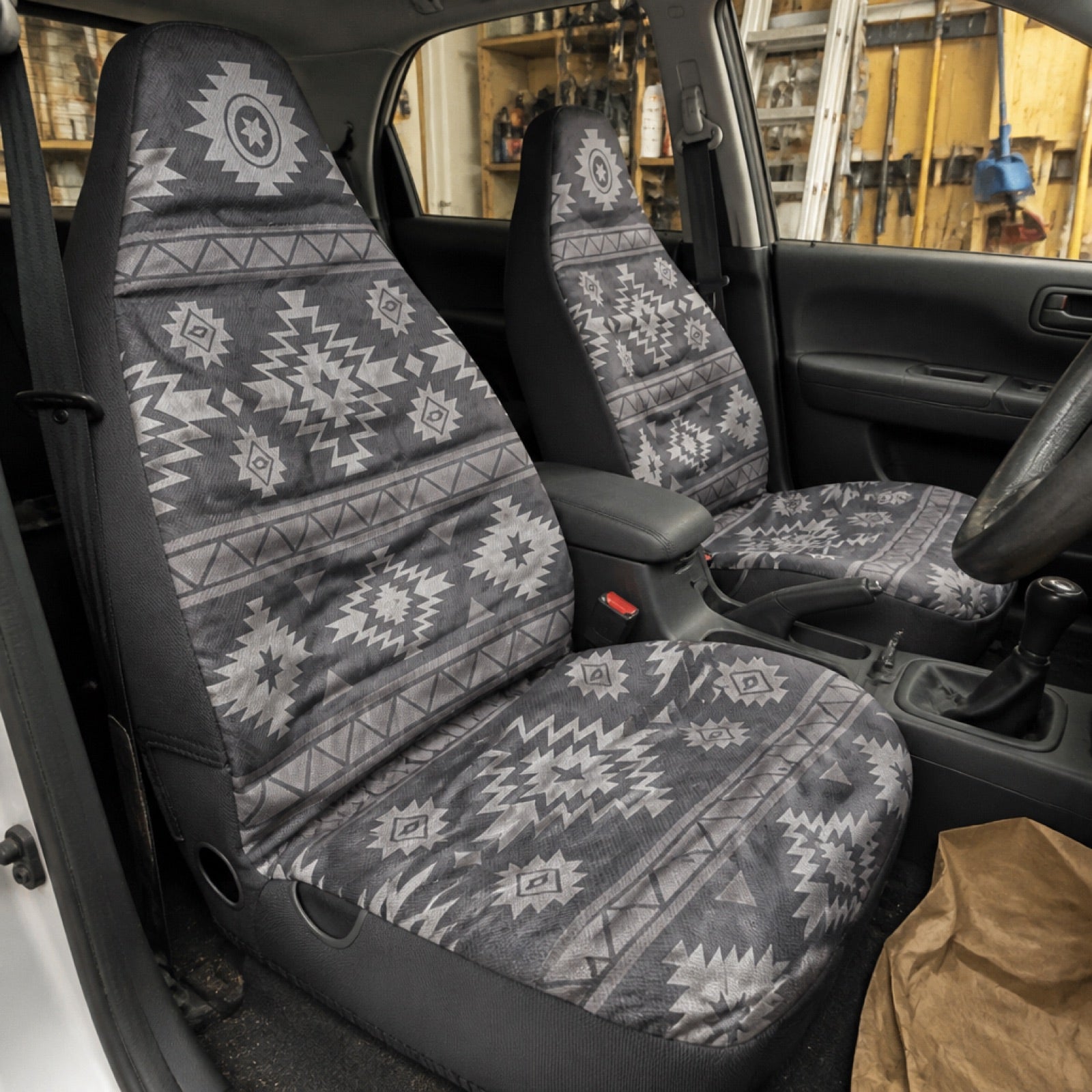 Black and grey Aztec seat covers in a compact SUV | Solara Covers