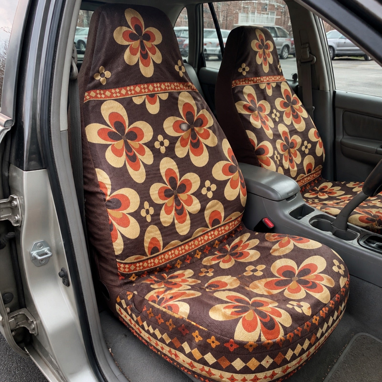 Boho seat covers installed on the front seats of a Nissan Murano