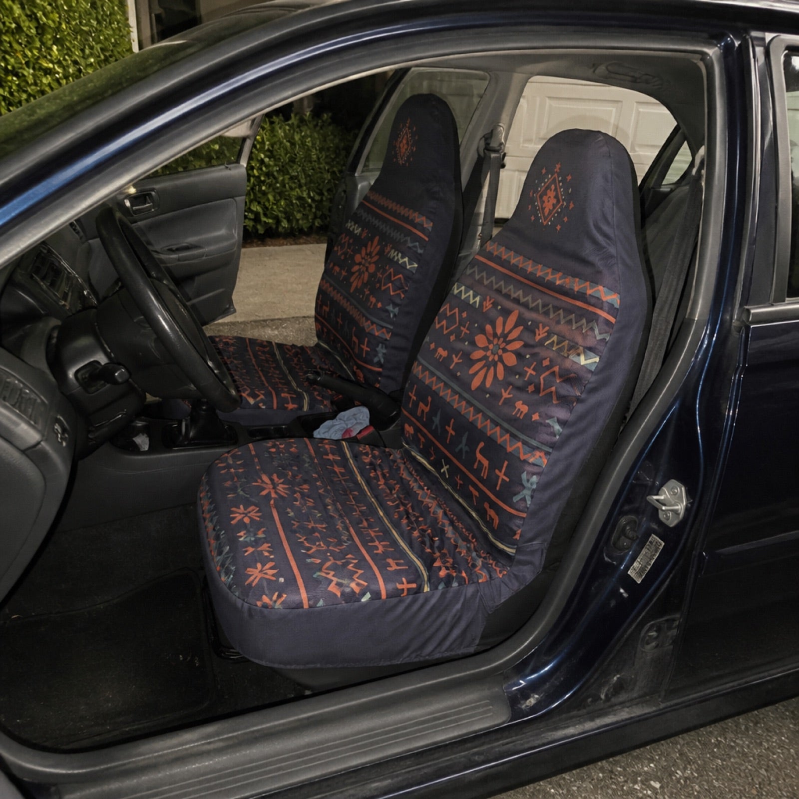 Boho seat covers installed on the front seats of a Ram truck