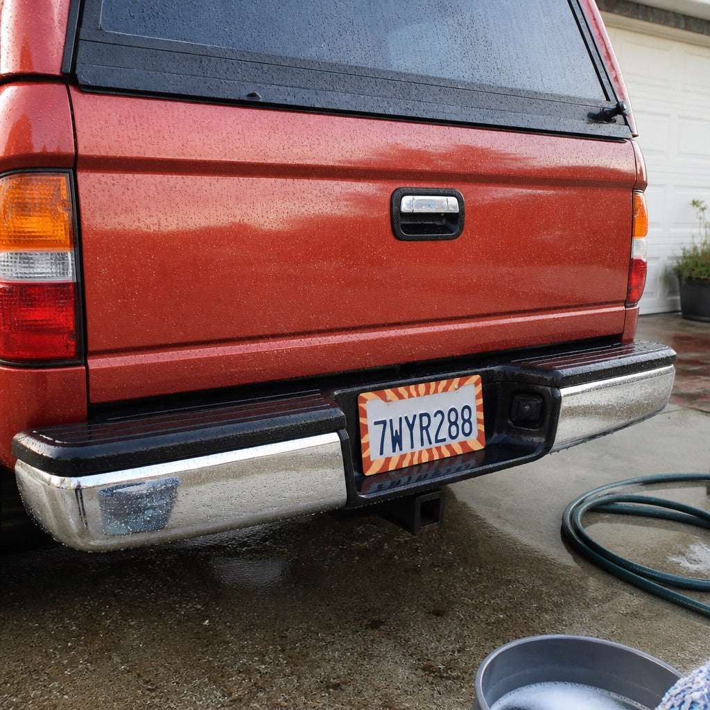 License plate frame with screws shown up close