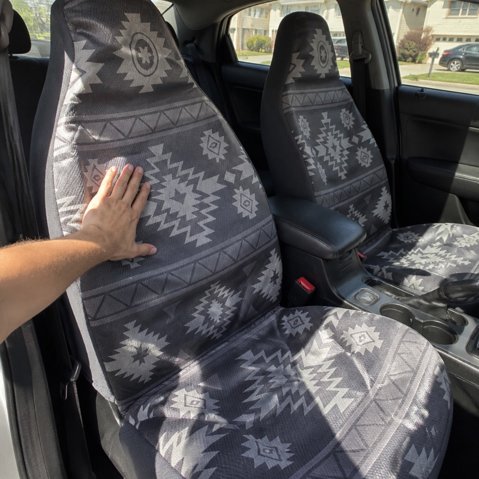 Boho seat covers installed on the front seats of a semi truck