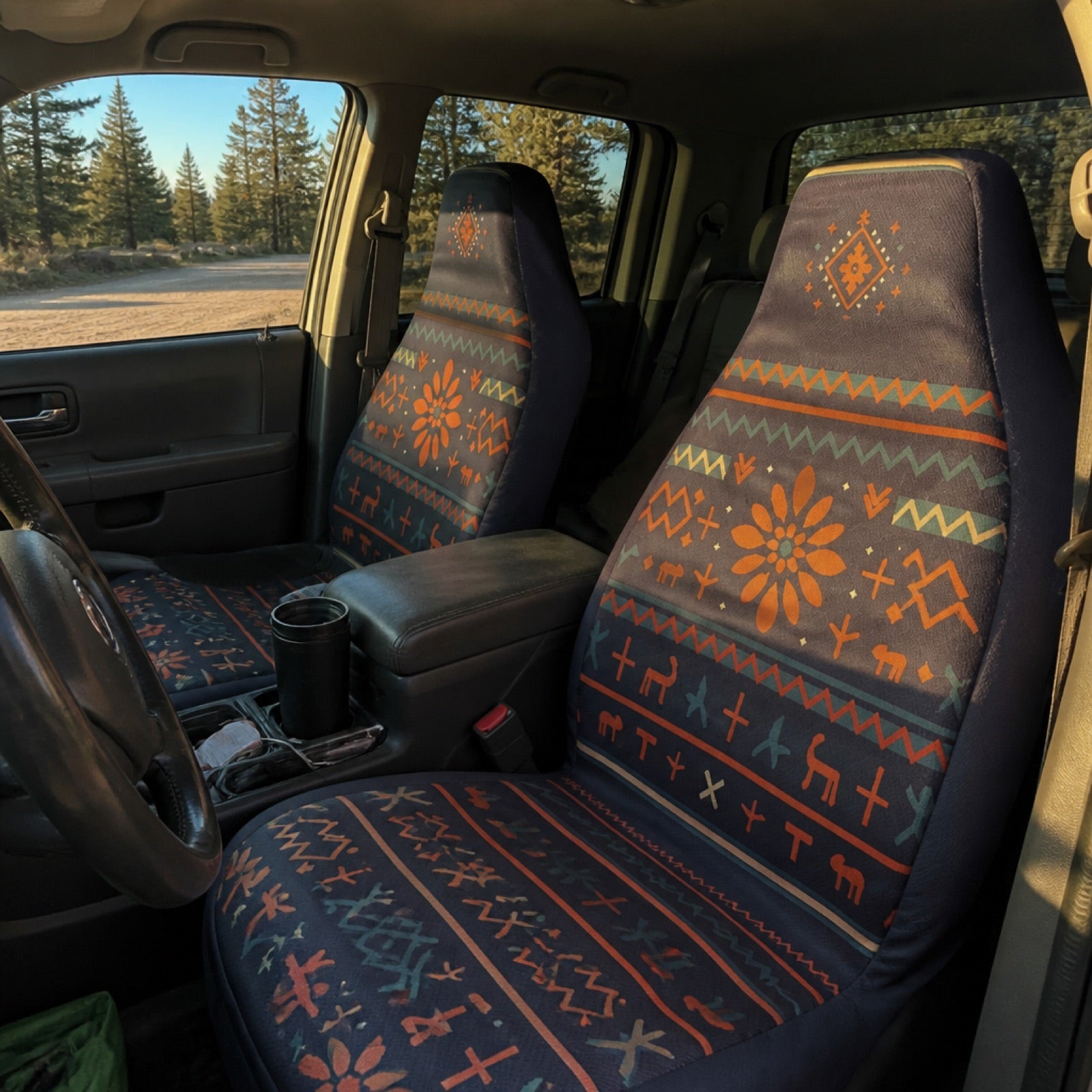 Navy and orange folk print seat covers in a trail SUV | Solara Covers