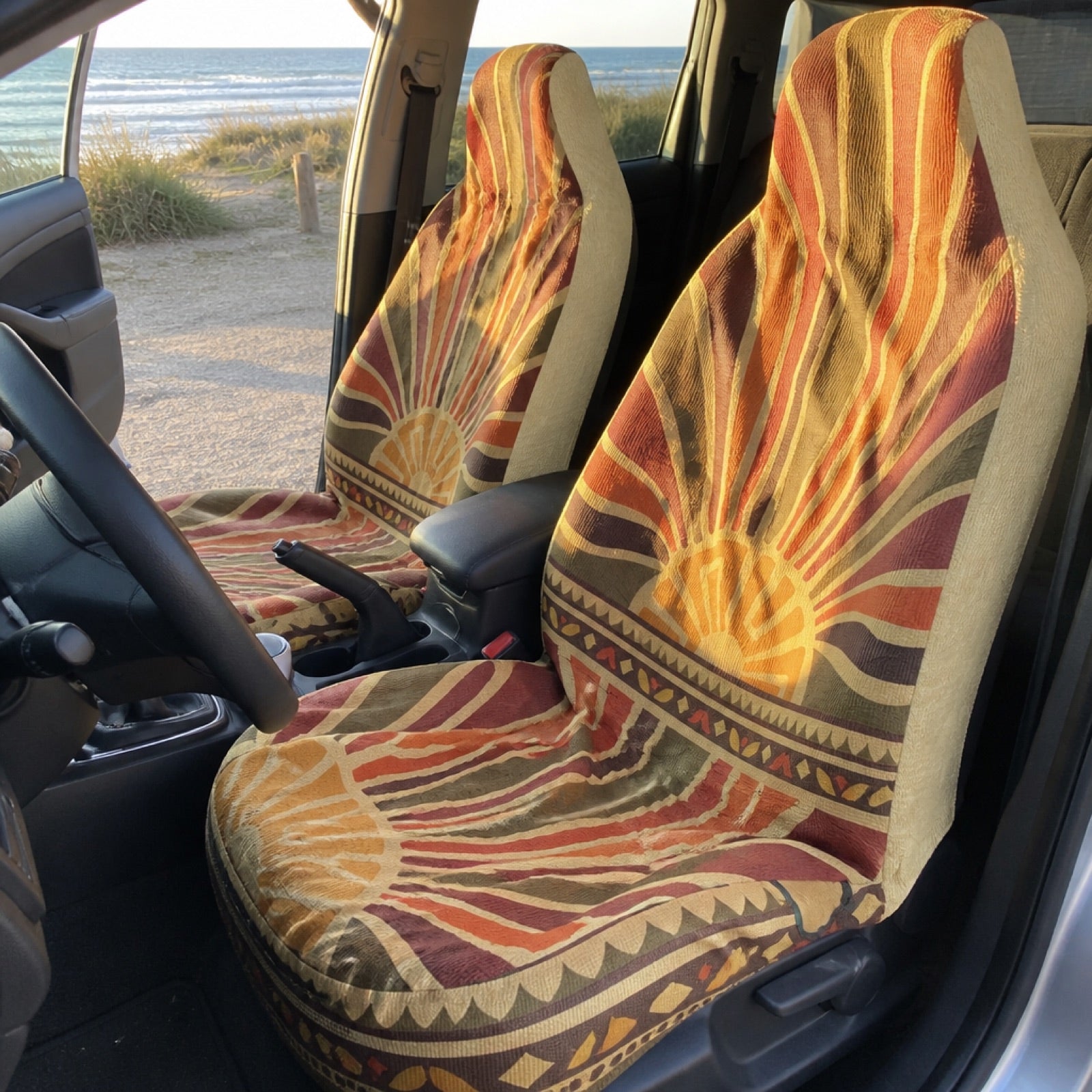 Boho seat covers installed on the front seats of a VW Jetta