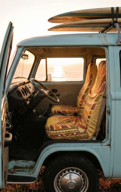 Halo Aztec seat cover lifestyle shot — sunrise red and orange print | Solara Covers