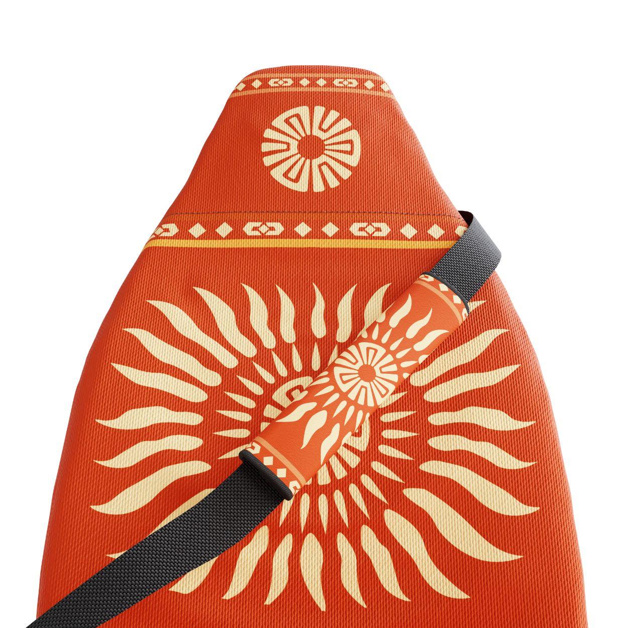 Sol seat belt covers pair installed in van — warm orange Aztec padded sleeves | Solara Covers