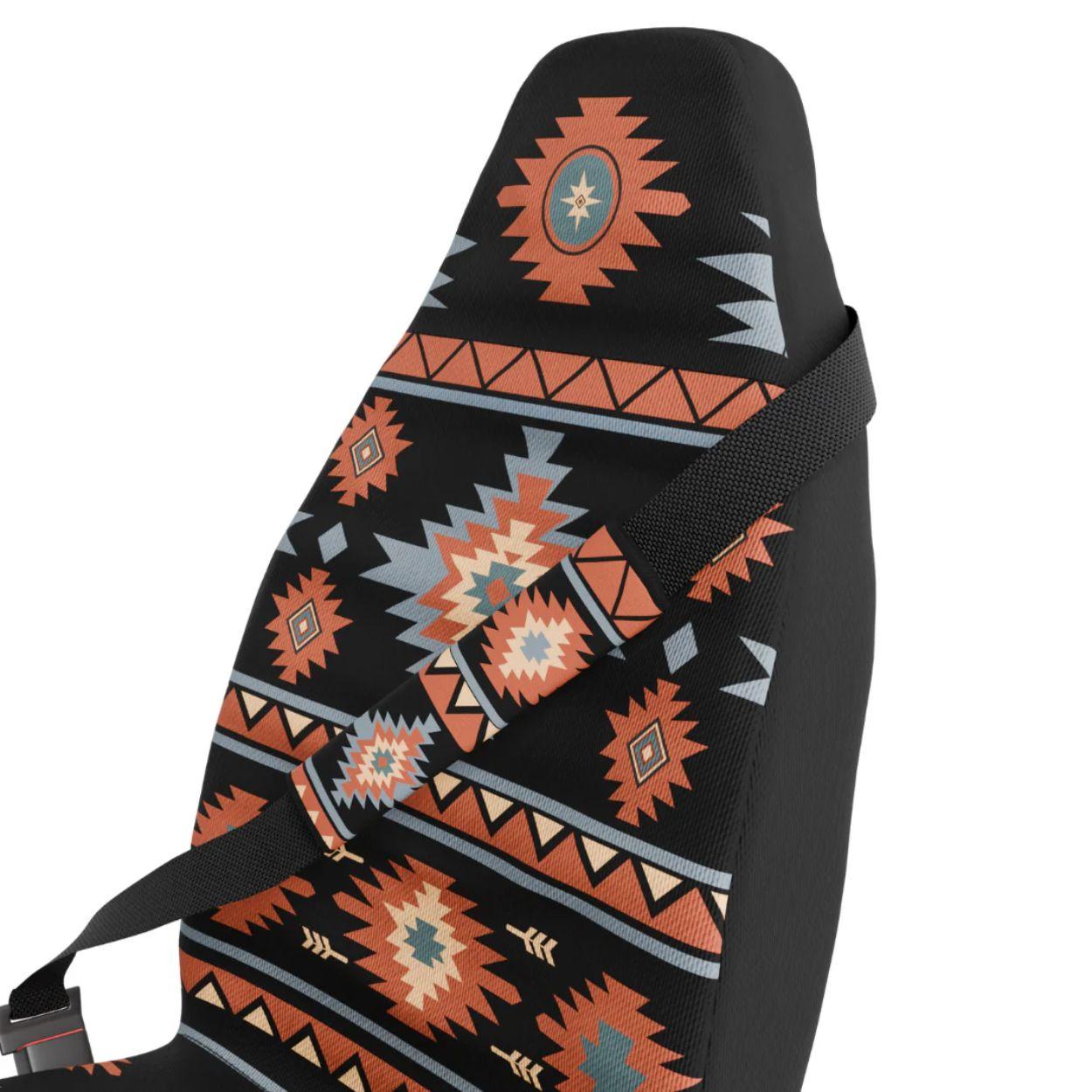 Zara seat belt sleeve close-up — black, red and orange Aztec pattern by Solara Covers