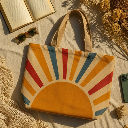 Aurora tote bag flat lay with an open book, sunglasses and dried flowers