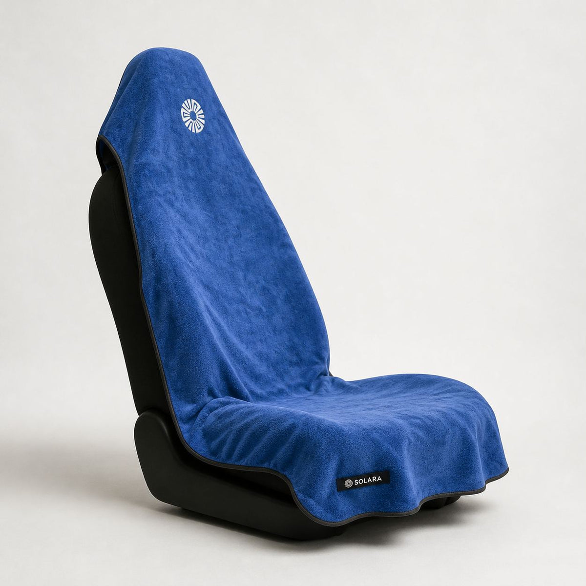 Marina blue car seat towel by Solara on a car seat, side view