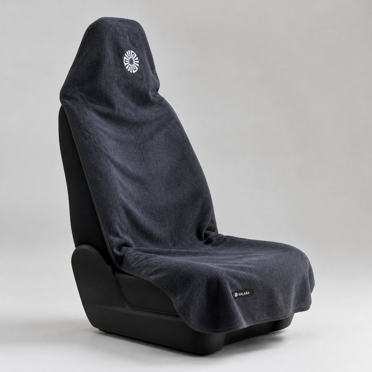 Neblina grey car seat towel by Solara on a car seat, side view