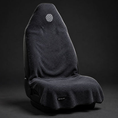 Neblina grey car seat towel by Solara on a car seat, studio shot