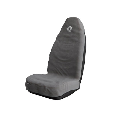 Neblina grey car seat towel by Solara on a front car seat, embroidered sun logo on the headrest