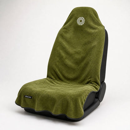 Oliva olive green car seat towel by Solara on a car seat, angled view from the left