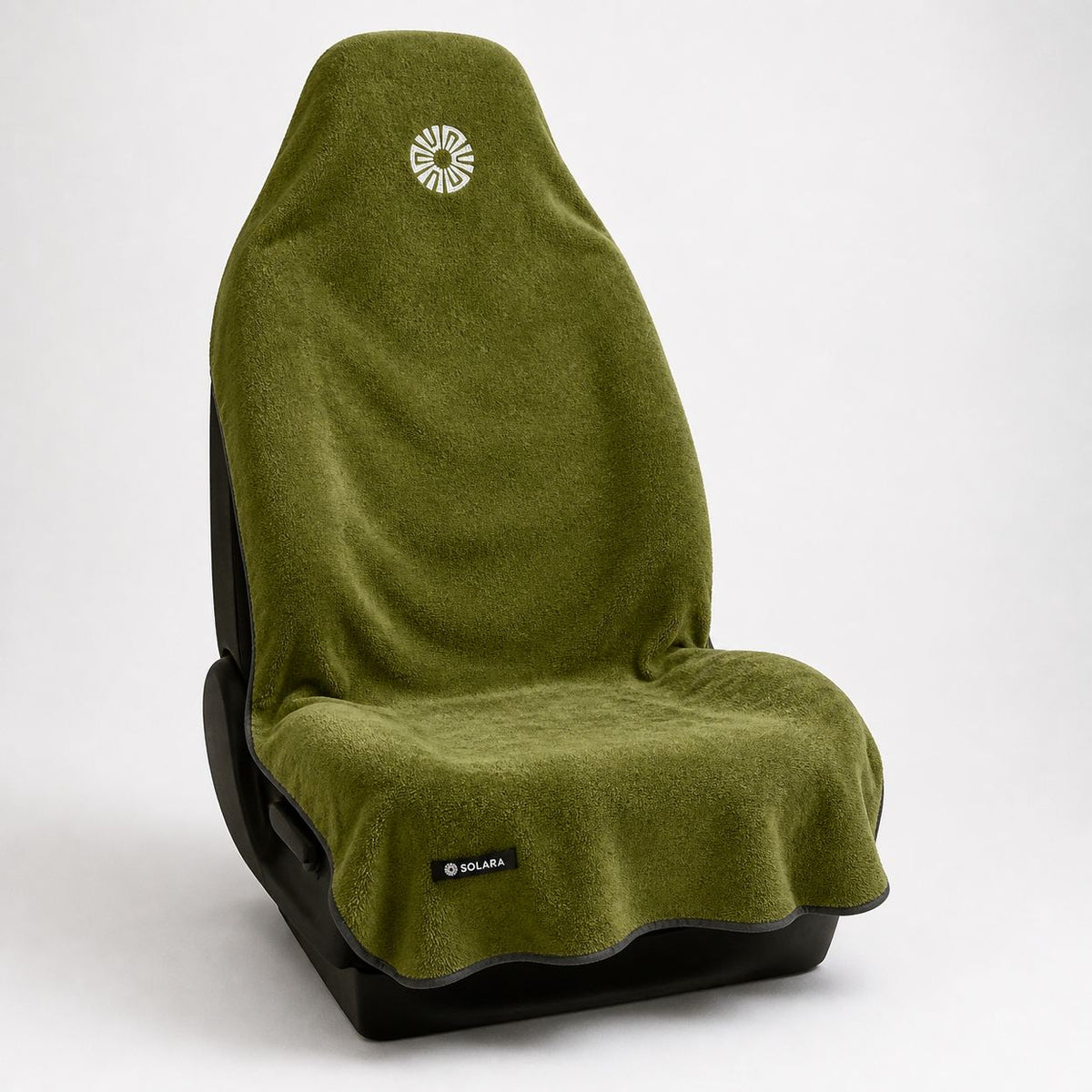 Oliva olive green car seat towel by Solara on a car seat, angled view from the right