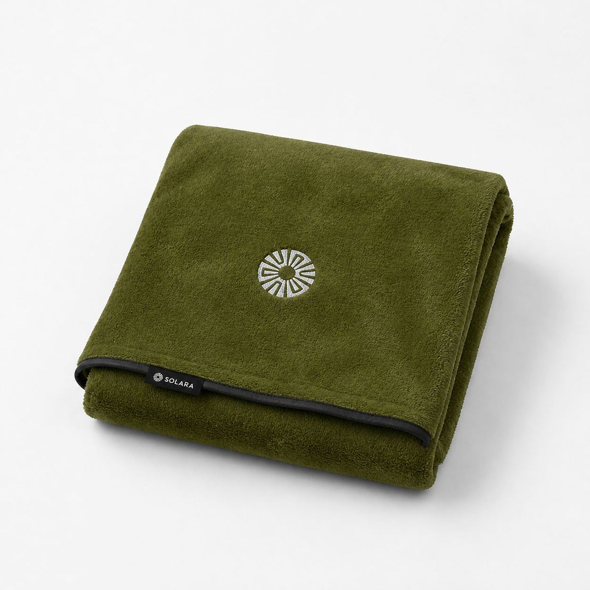 Oliva olive green car seat towel by Solara folded, embroidered sun logo on top