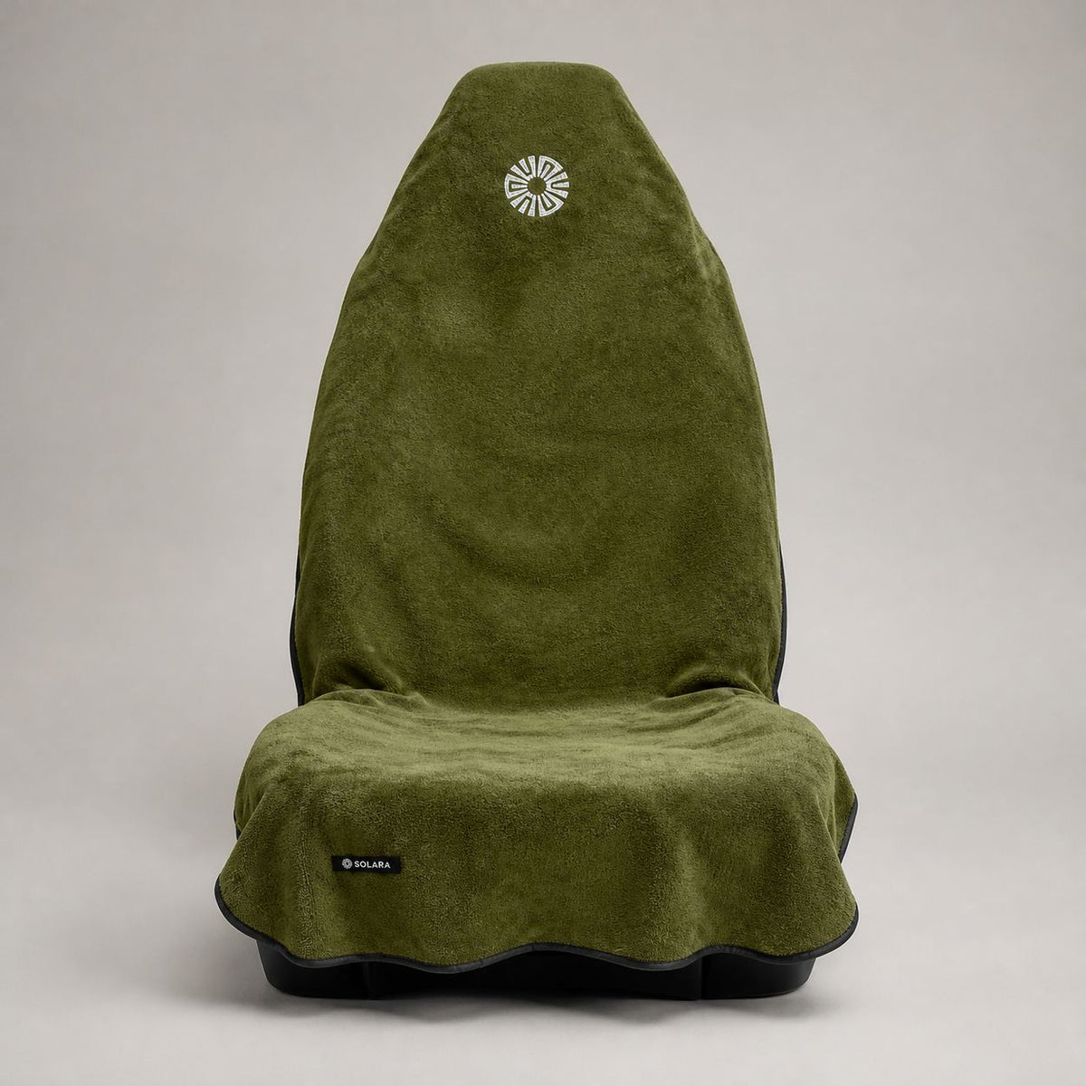 Oliva olive green car seat towel by Solara covering a front car seat, front view