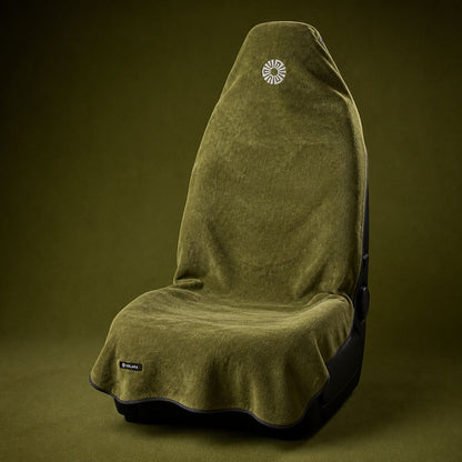 Oliva olive green car seat towel by Solara on a car seat, studio shot