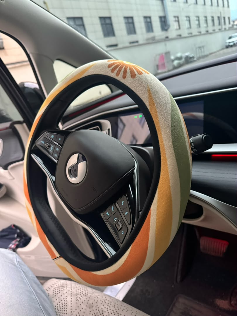 Ripple steering wheel cover — tangerine, mustard, olive and cream wave print, faux suede with neoprene grip | Solara