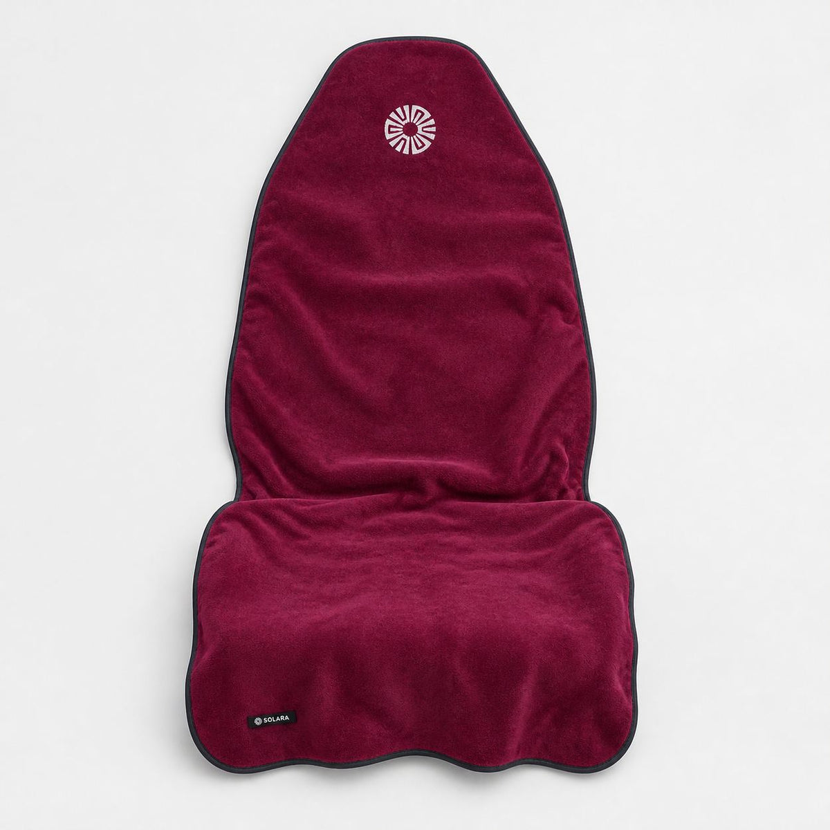Rosa pink car seat towel by Solara laid out flat, showing the full shape with the hood
