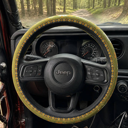 Woodstock steering wheel cover by Solara on a car steering wheel, driver&