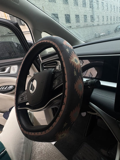 Zara steering wheel cover installed in a car, driver&
